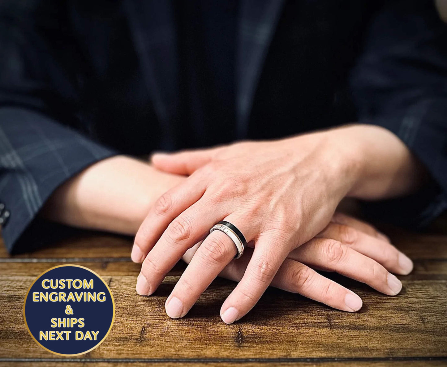 black tungsten carbide ring made with deer antler and rose gold