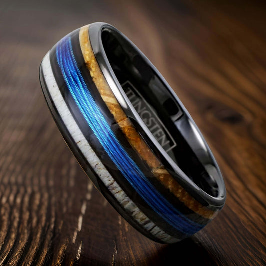 tungsten ring with blue fishing line, whisky barrel wood, and deer antler