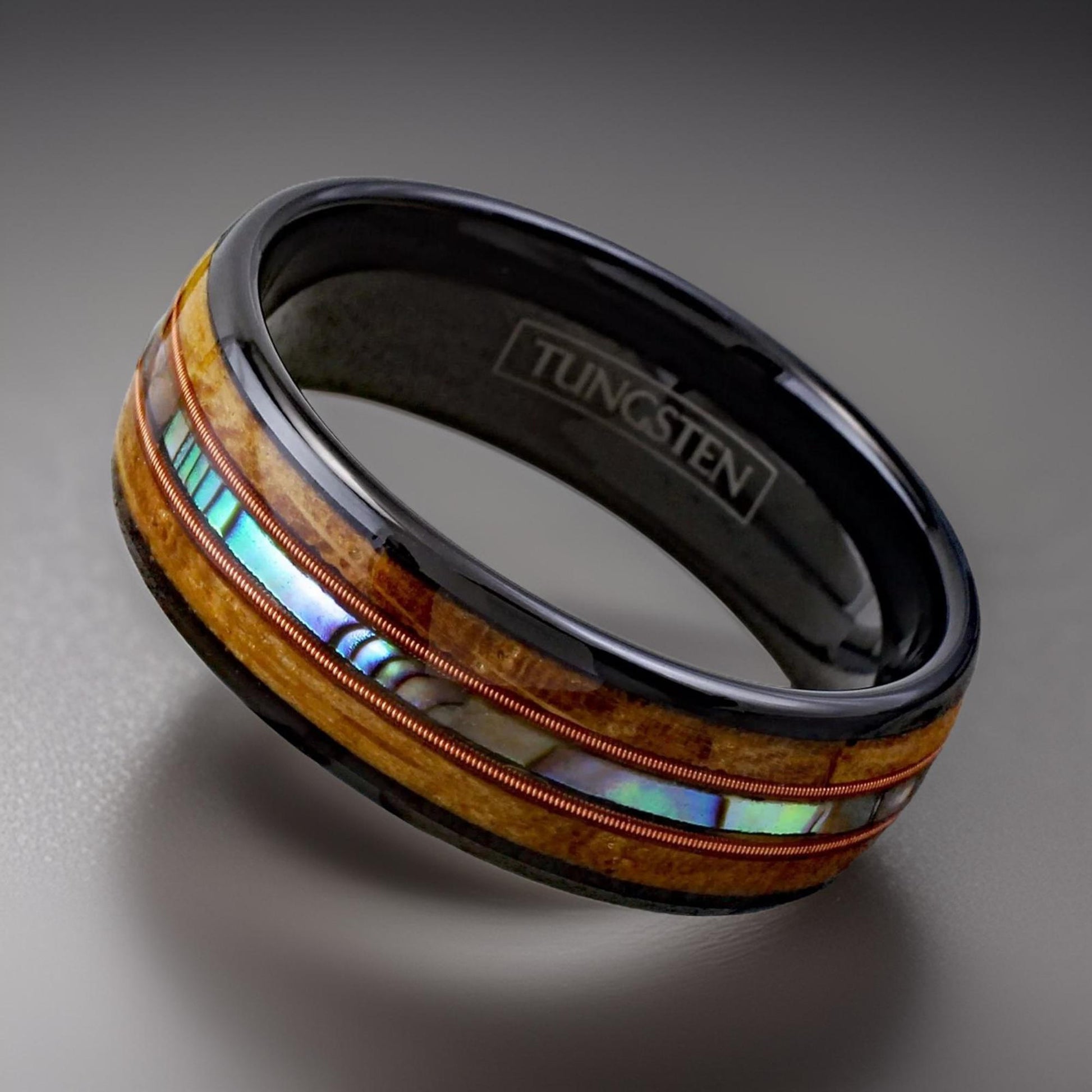 durable tungsten ring with whiskey wood, copper wire, and abalone shell.