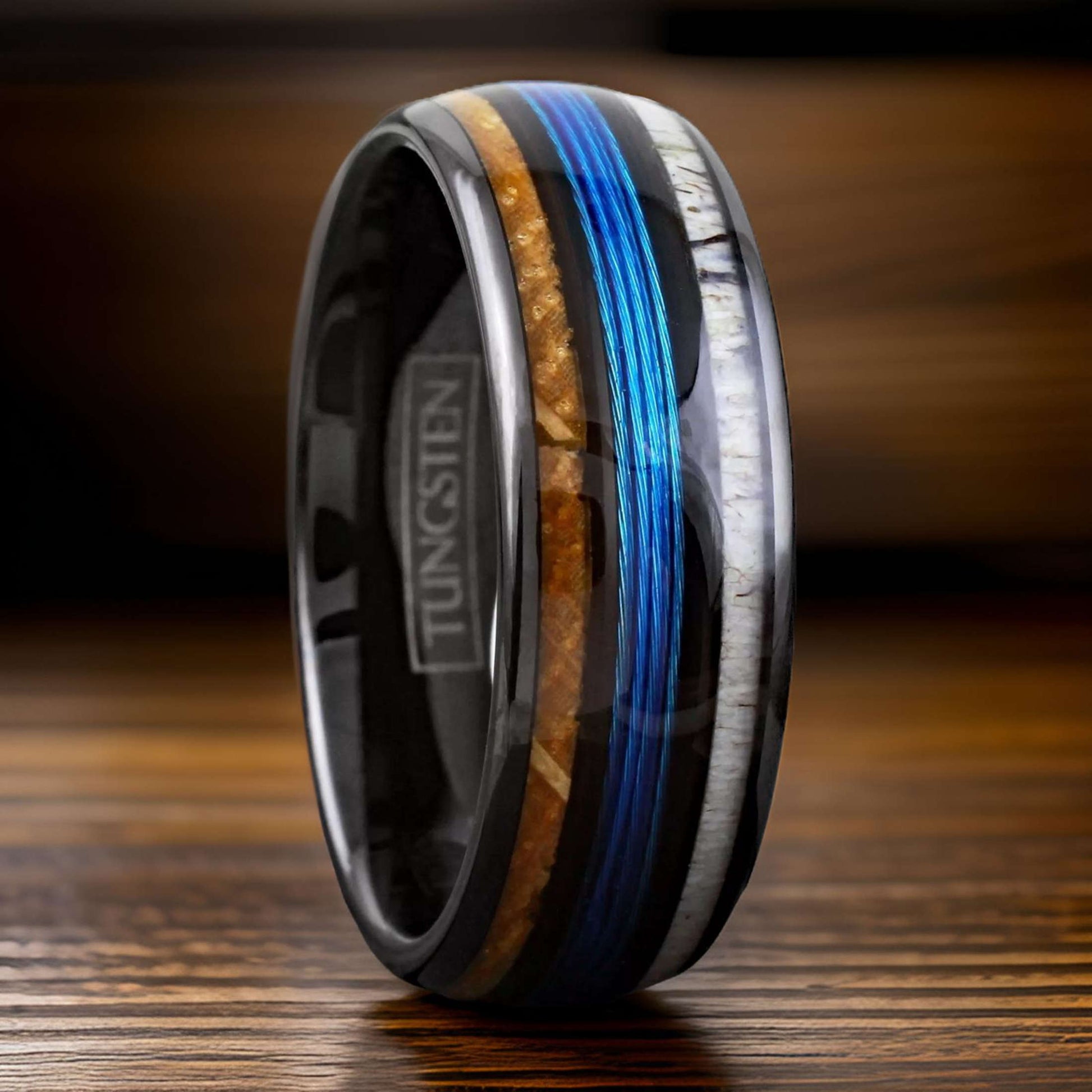 wedding band with fishing line, deer antler, and whiskey wood