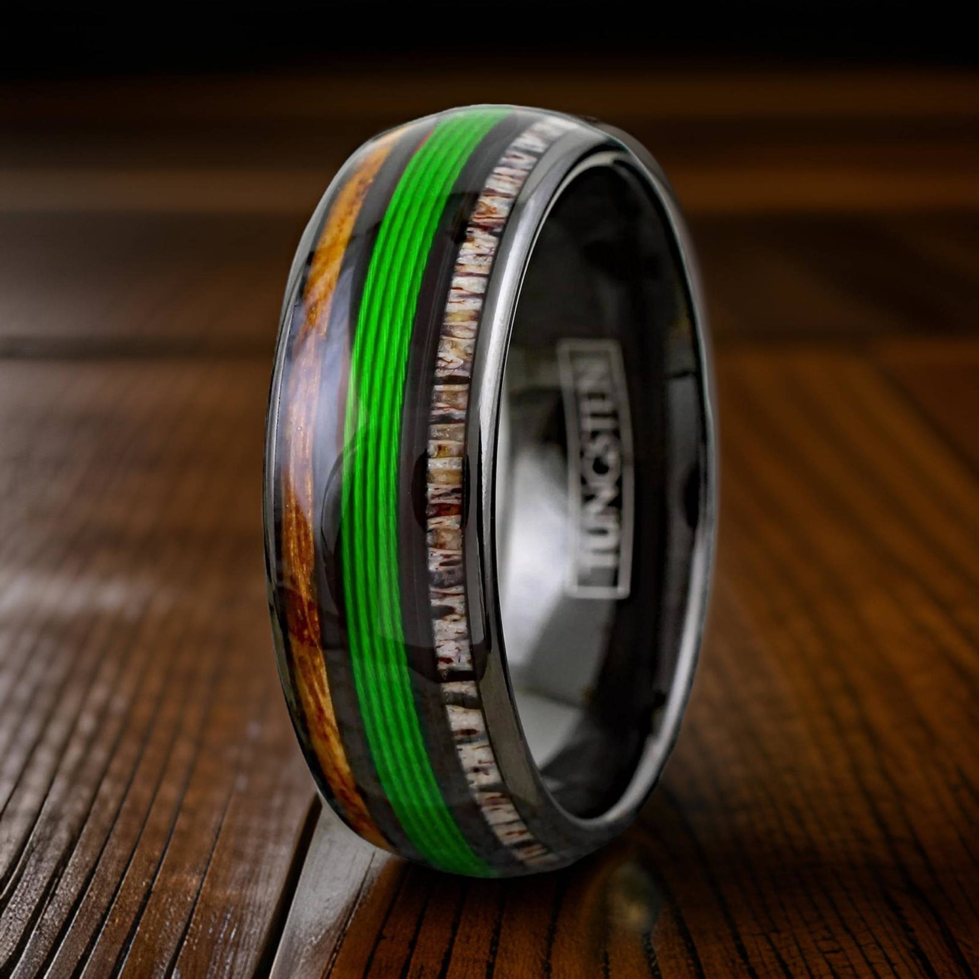 black tungsten ring with green fishing wire