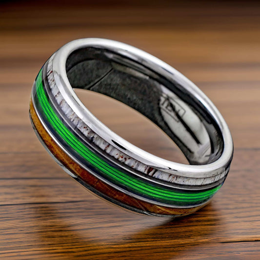 silver tungsten ring with whiskey wood, fishing line, and antler
