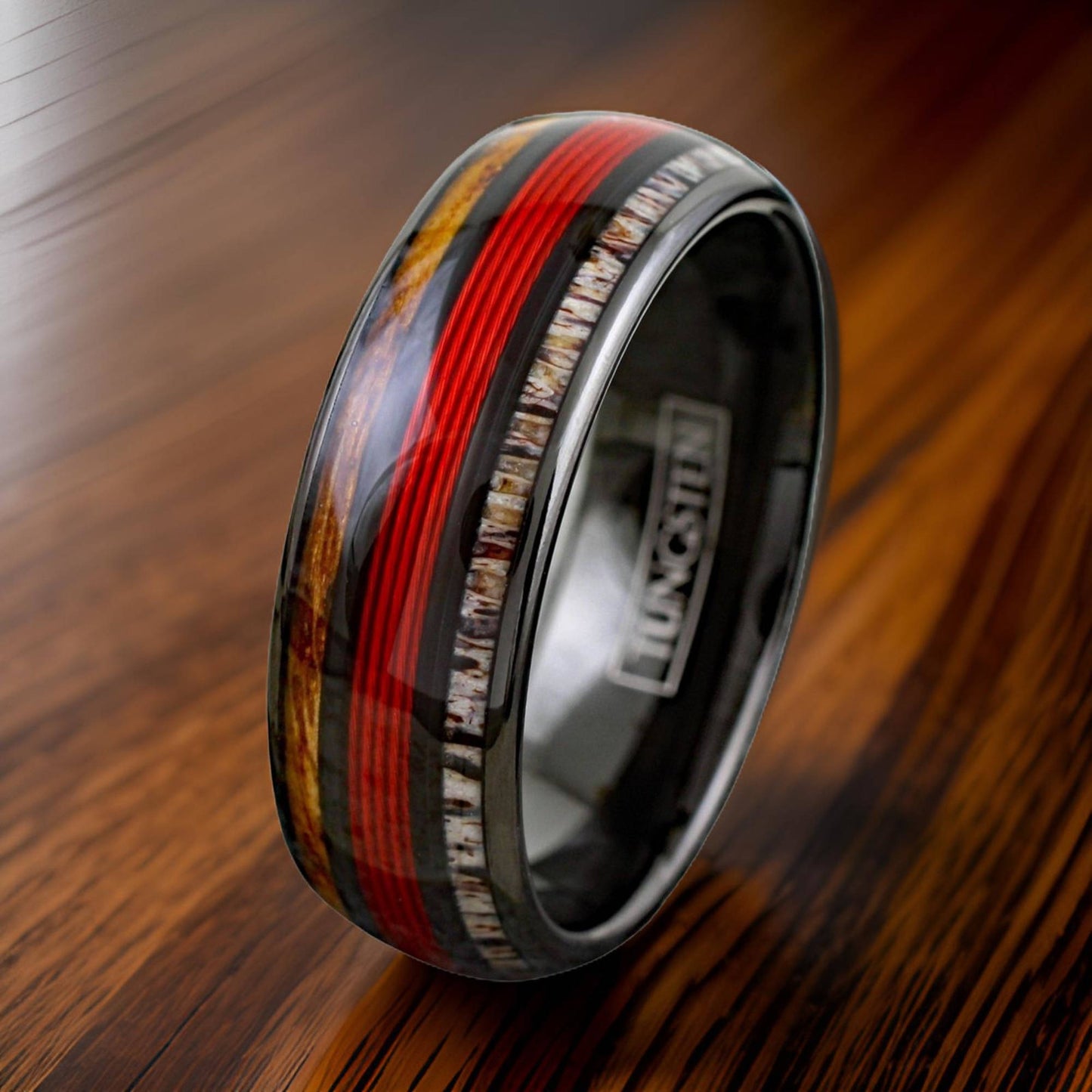 deer antler ring with red fishing line and whiskey wood