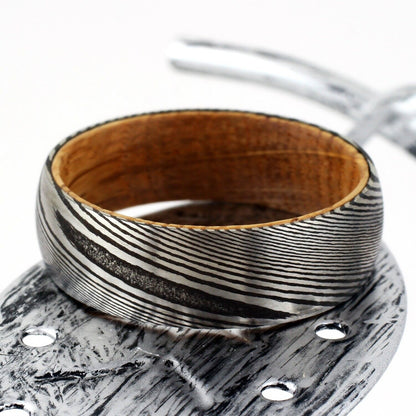 damascus steel and whiskey barrel wood ring
