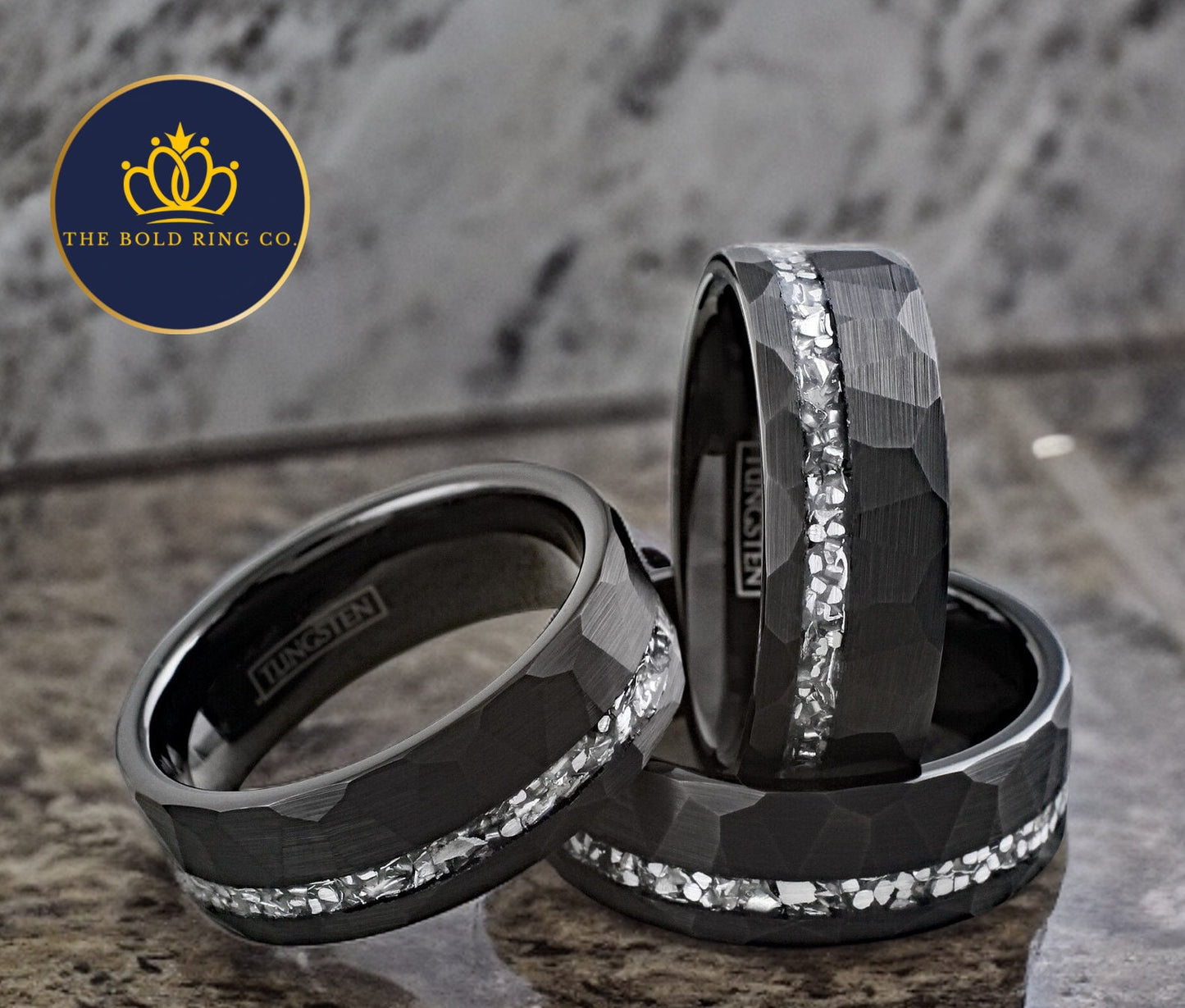 Black wedding band with silver meteorite.